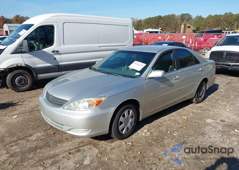 2003 Toyota Camry Le from USA, damaged, VIN 4T1BE32KX3U127390